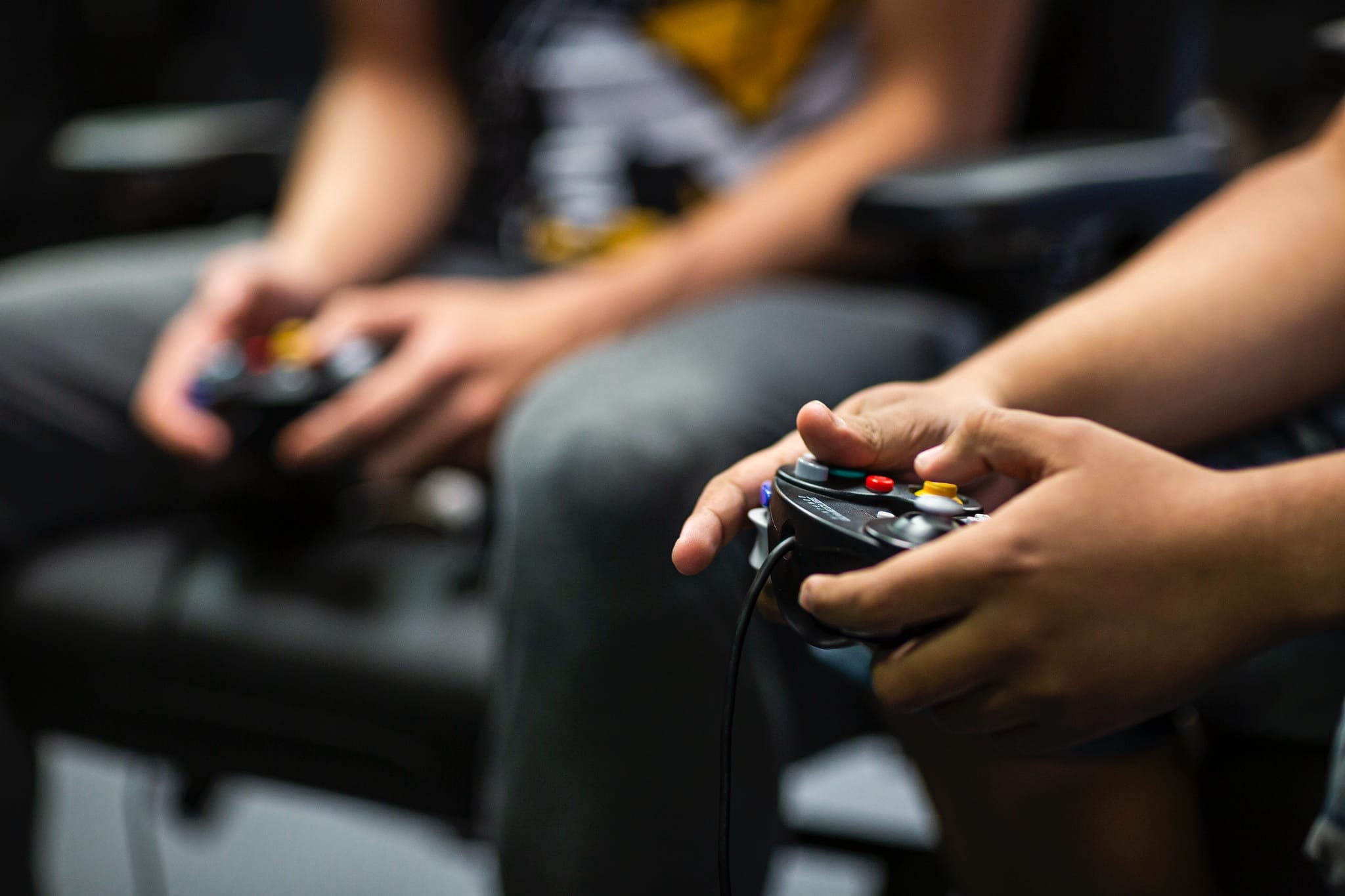 Esports two male students with controllers