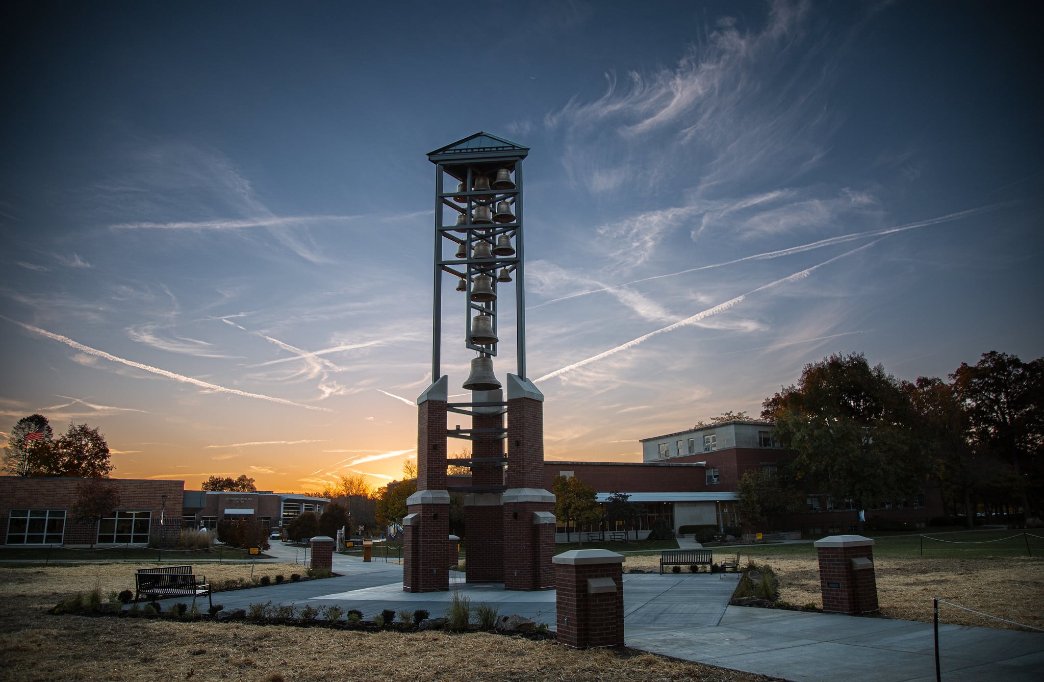 Bell tower in front of a sunset