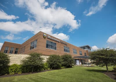 External image of the Fort Wayne Campus featuring Manchester University signage and landscaping