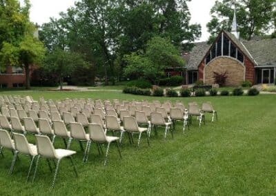 Rows of chairs set up outside Petersime Chapel