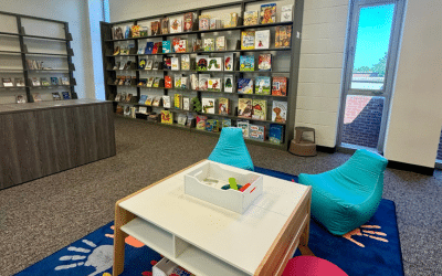 Literacy Lab with bean bag chairs, kids' toys, and bookshelves