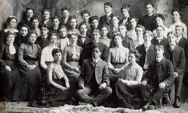Historical group photo of male and female students