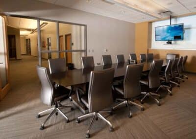 Meeting Room with table, chairs, and TV