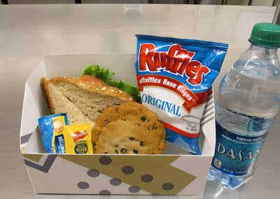 Box Lunch with sandwich, cookie, chips, and bottled water