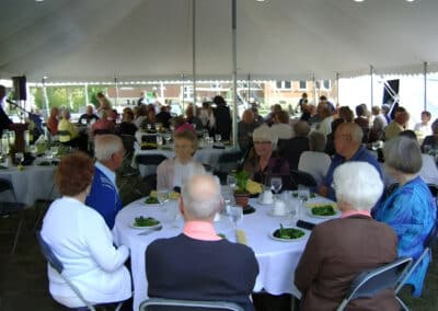 Table with people at an outdoor reception