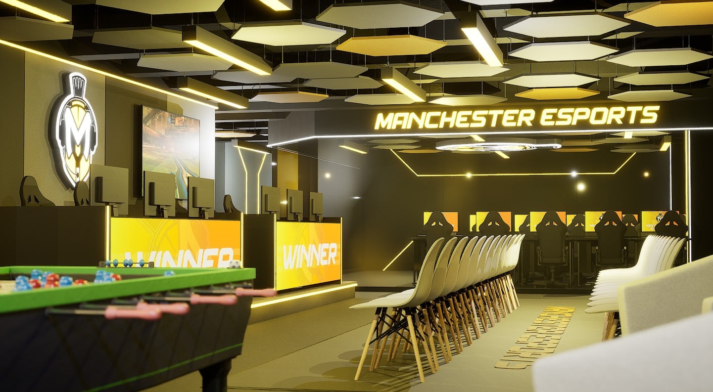 Bright neon Manchester Esports Sign illuminates the room as well as LED screen displays with the words "Winner" across them to display when a game is completed with full viewing area from spectators and a foosball table on the side.